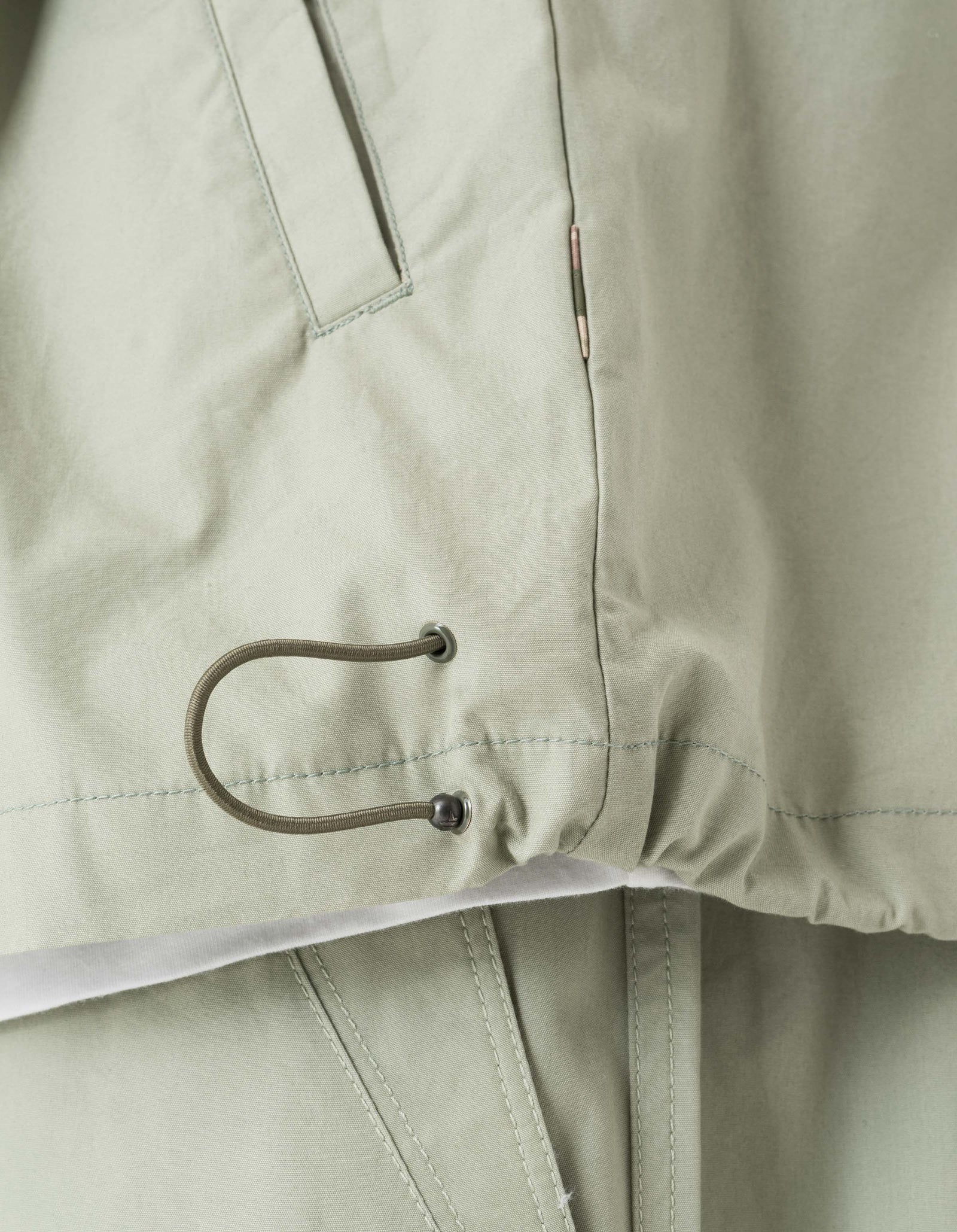 7211 Asym Woven Track Top Sage